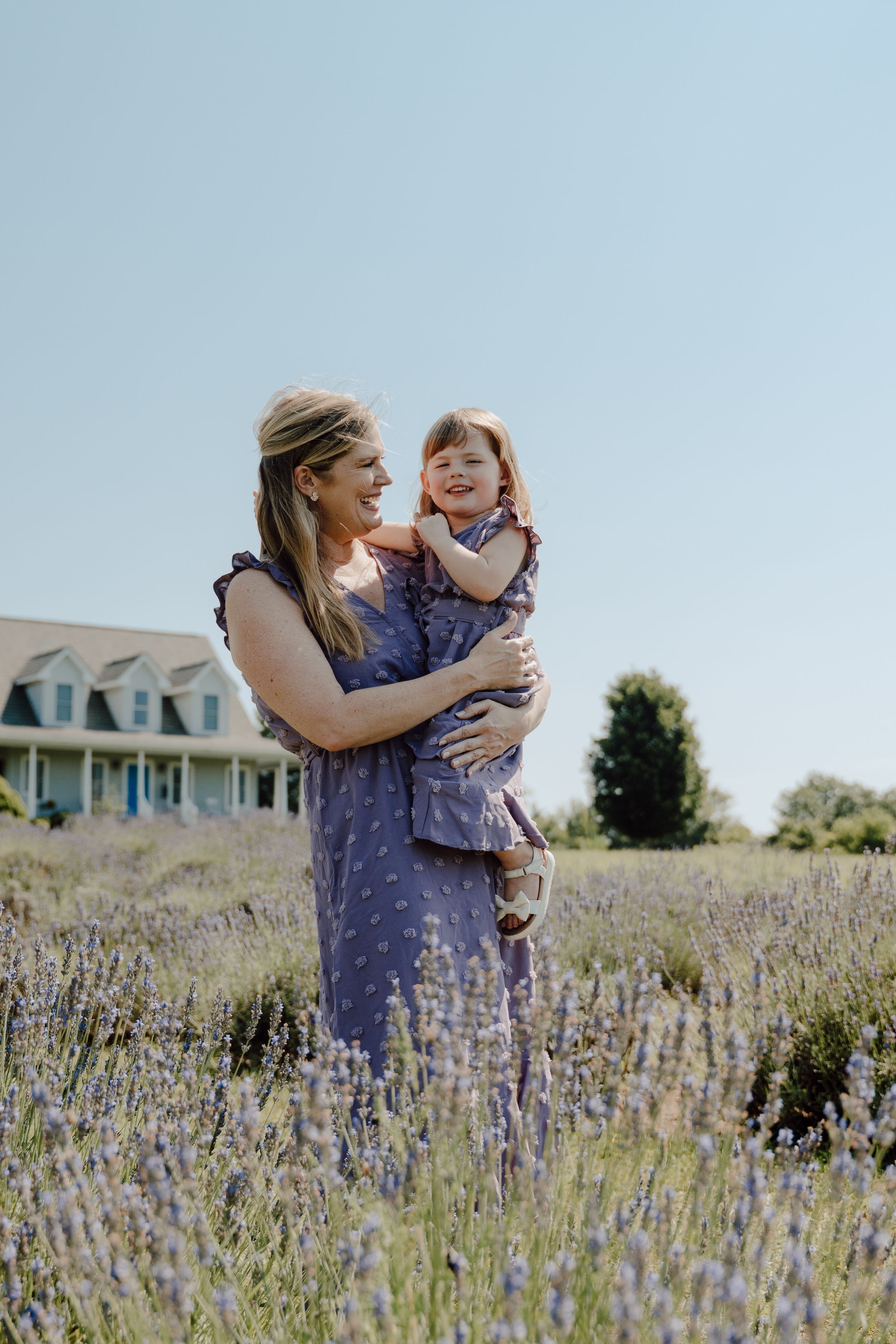 Lifestyle family photography focused on natural interaction, movement, and real moments between parents and children.
