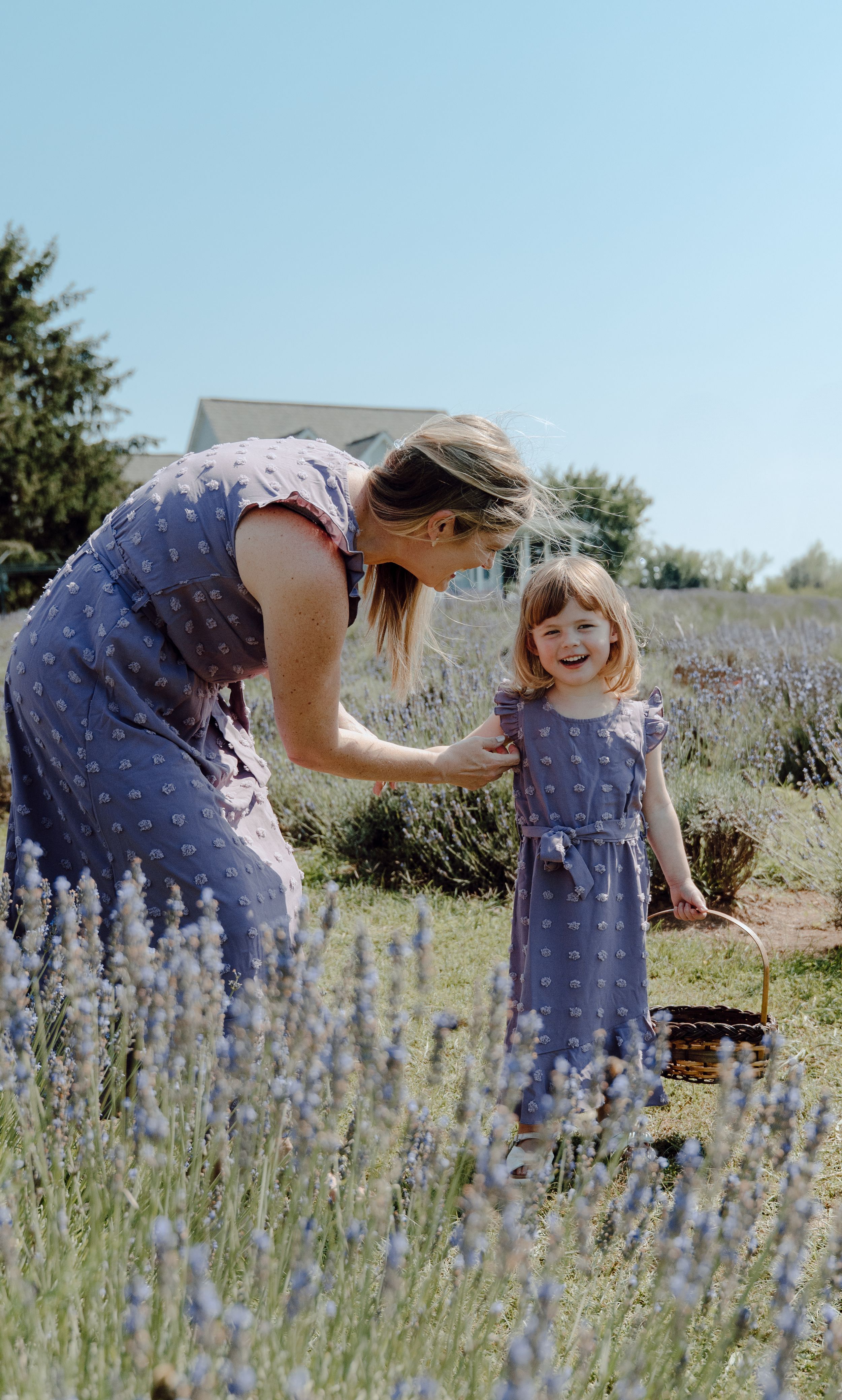 Lifestyle family photography focused on natural interaction, movement, and real moments between parents and children.