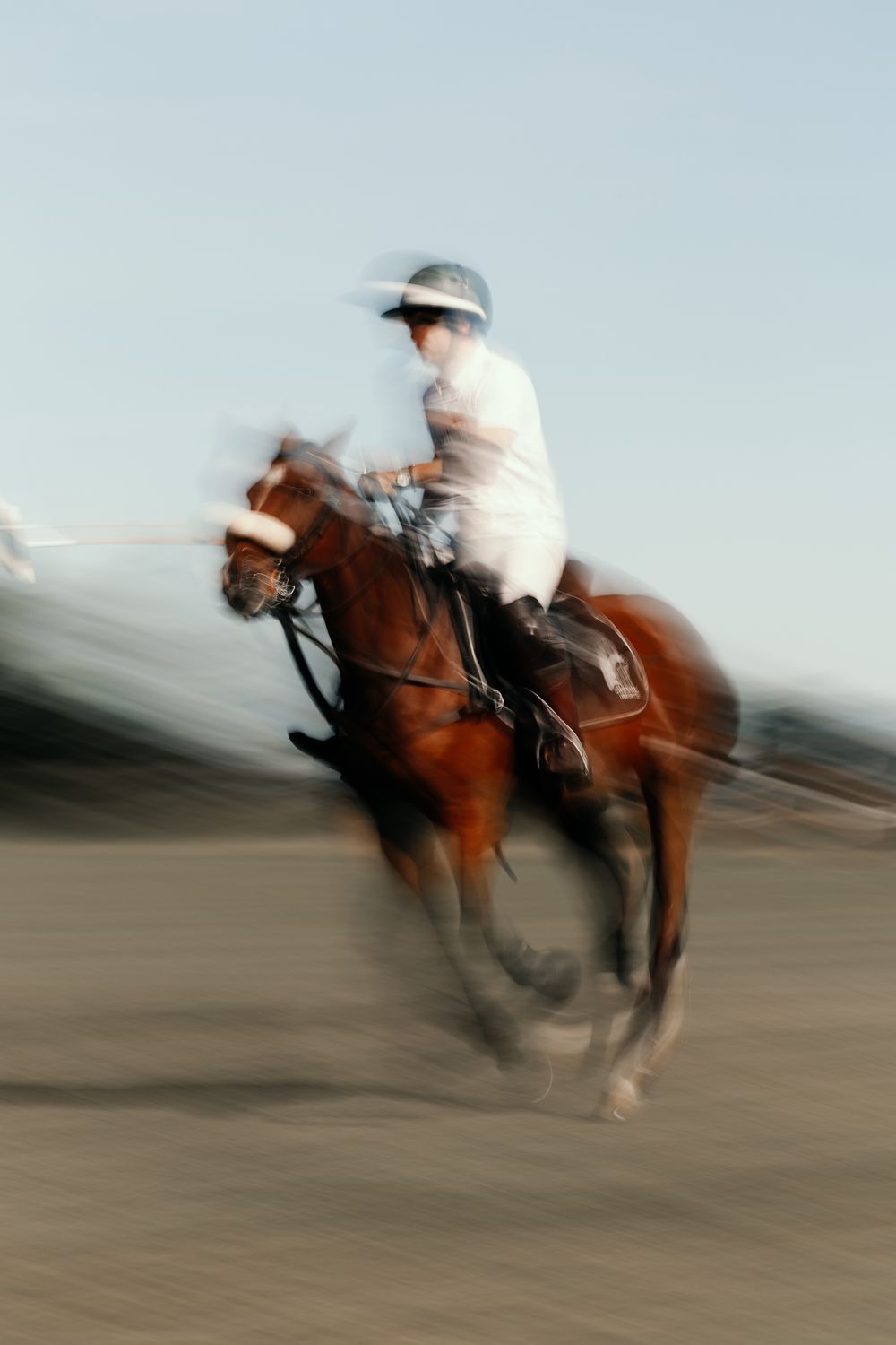 Polo player captured in full speed with long exposure