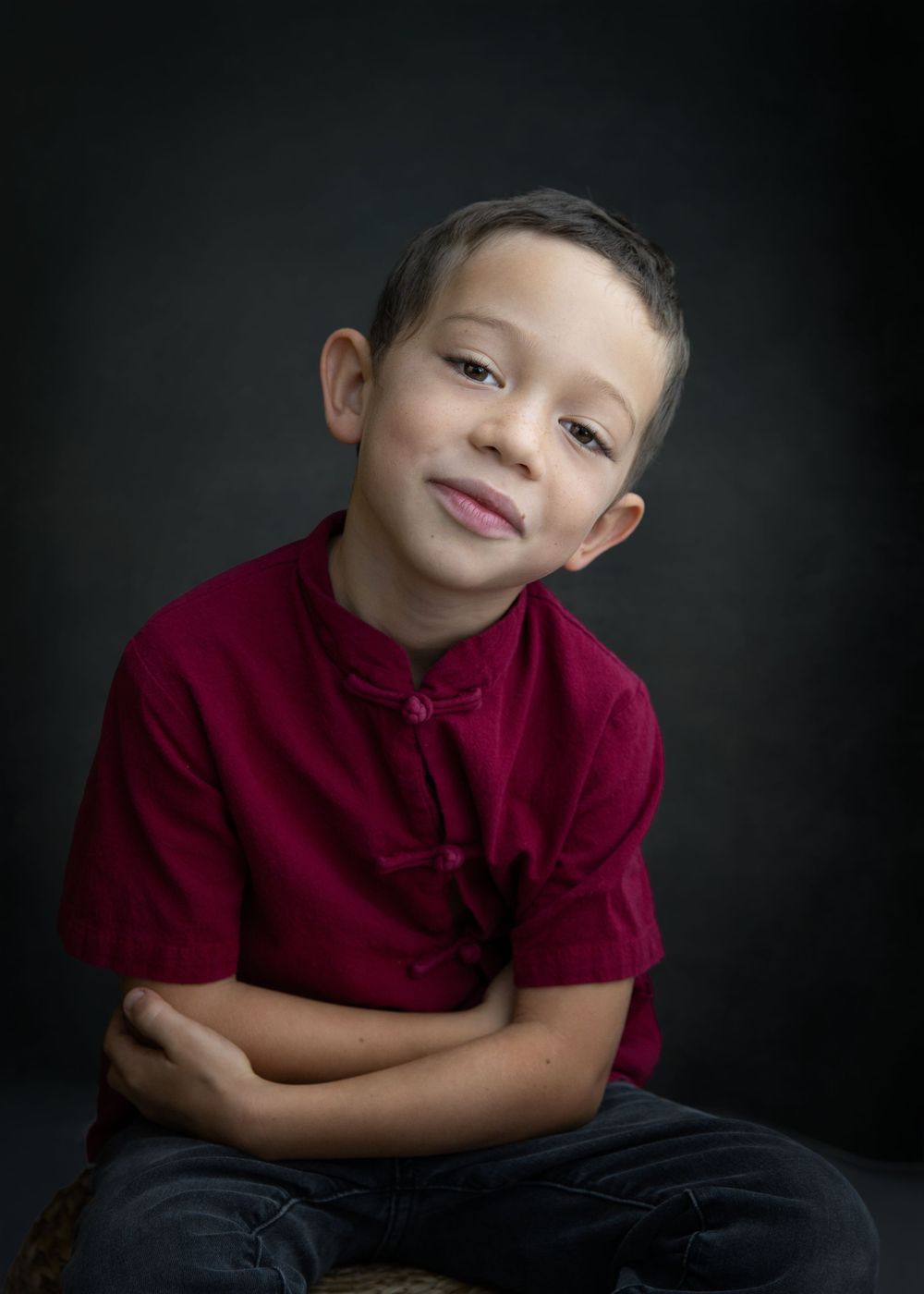 Best Hong Kong family photographer Christmas photo shoot portrait of a boy in red