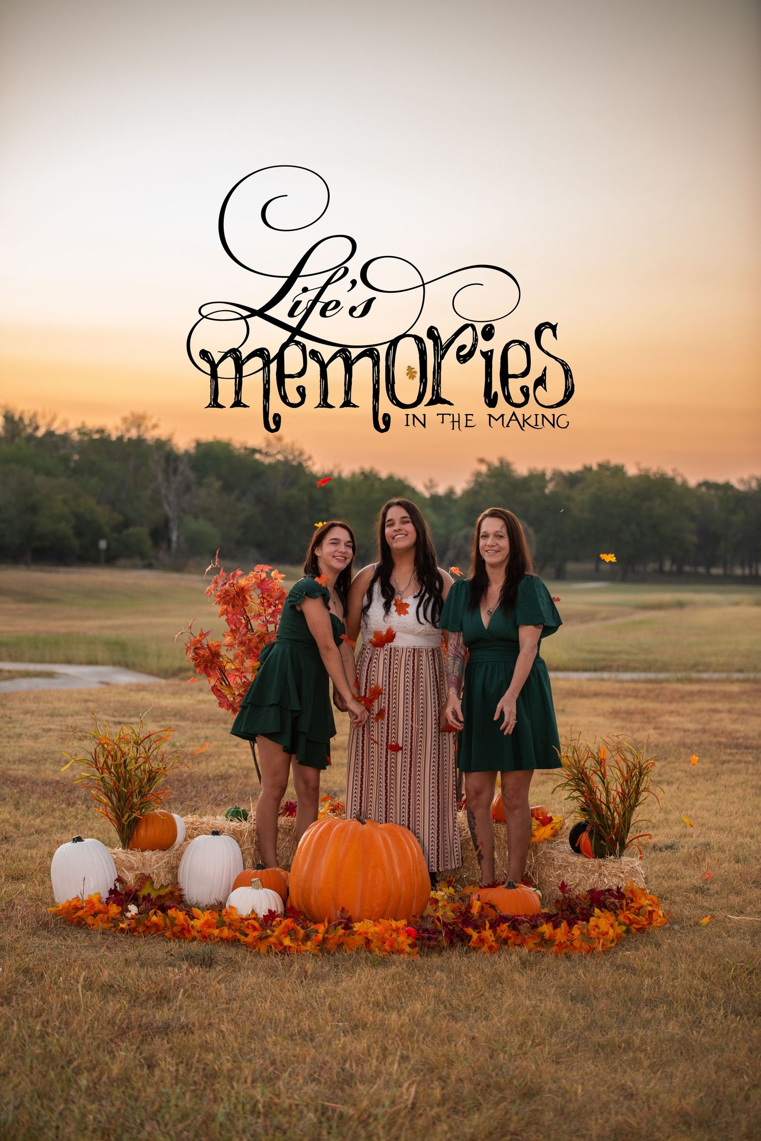 Fall outdoor photo session setup with pumpkins, autumn leaves, and rustic decor in a golden field at sunset.