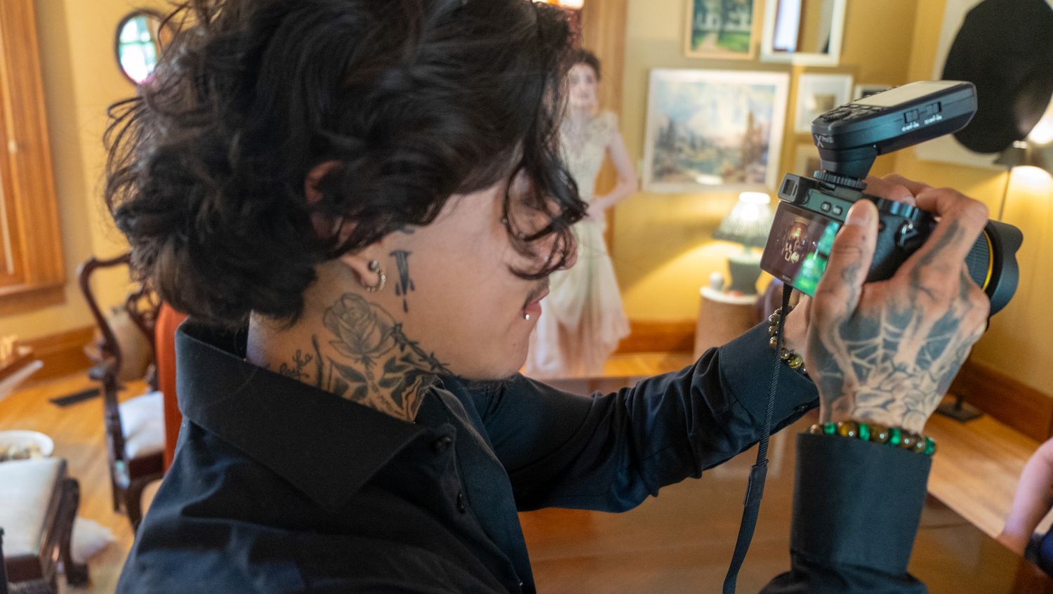Close-up view of hands taking measurements or notes during a detailed home inspection process.