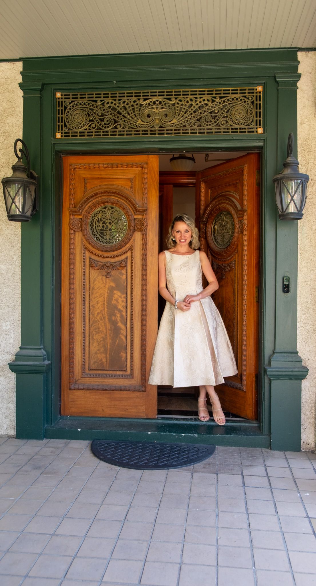 A sequence of photos showing someone playfully peeking out from behind an ornate wooden door with green trim.