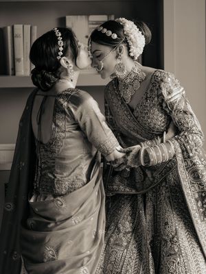 A series of black and white photos showing tender moments between two people in traditional South Asian attire.