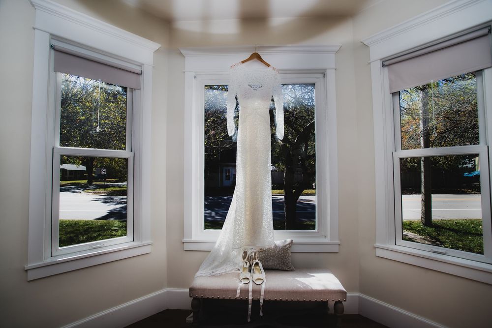 Bright white room with multiple windows and natural light streaming in.