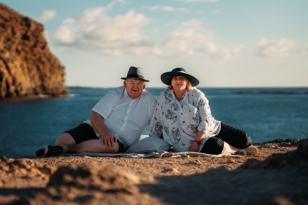 A heartfelt beach photoshoot of an elderly couple in Los Cristianos, Tenerife, Canary Islands. Capturing timeless love by the ocean.