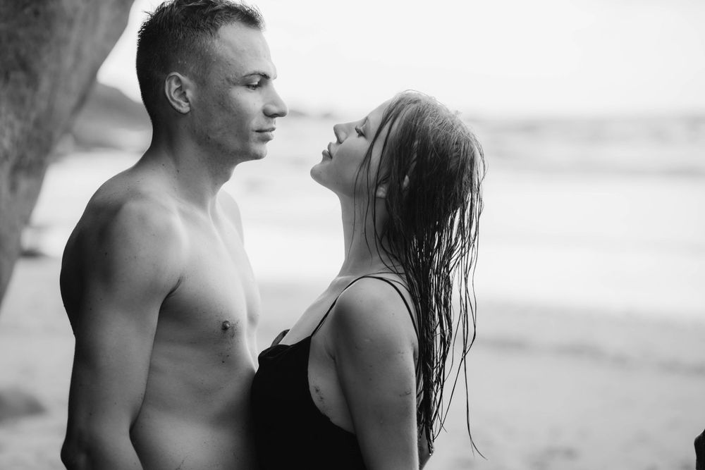 A romantic couples photoshoot at Playa del Roque de las Bodegas, Tenerife, Canary Islands. Capturing love amidst the rugged coastal beauty.