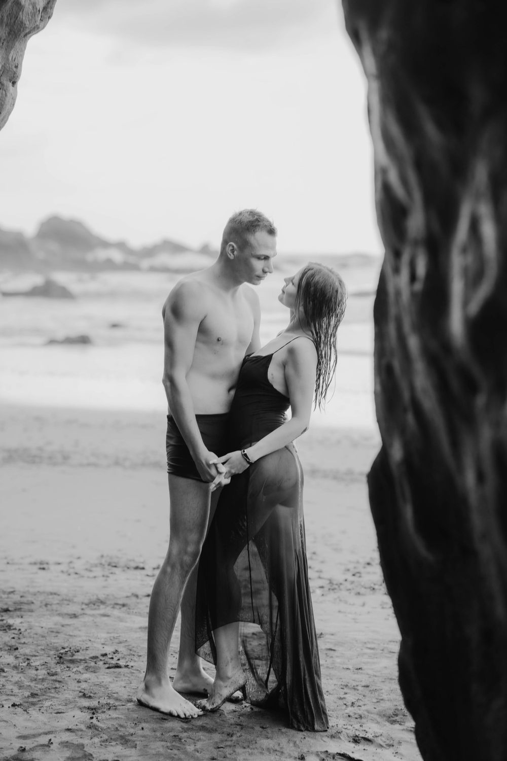 A romantic couples photoshoot at Playa del Roque de las Bodegas, Tenerife, Canary Islands. Capturing love amidst the rugged coastal beauty.