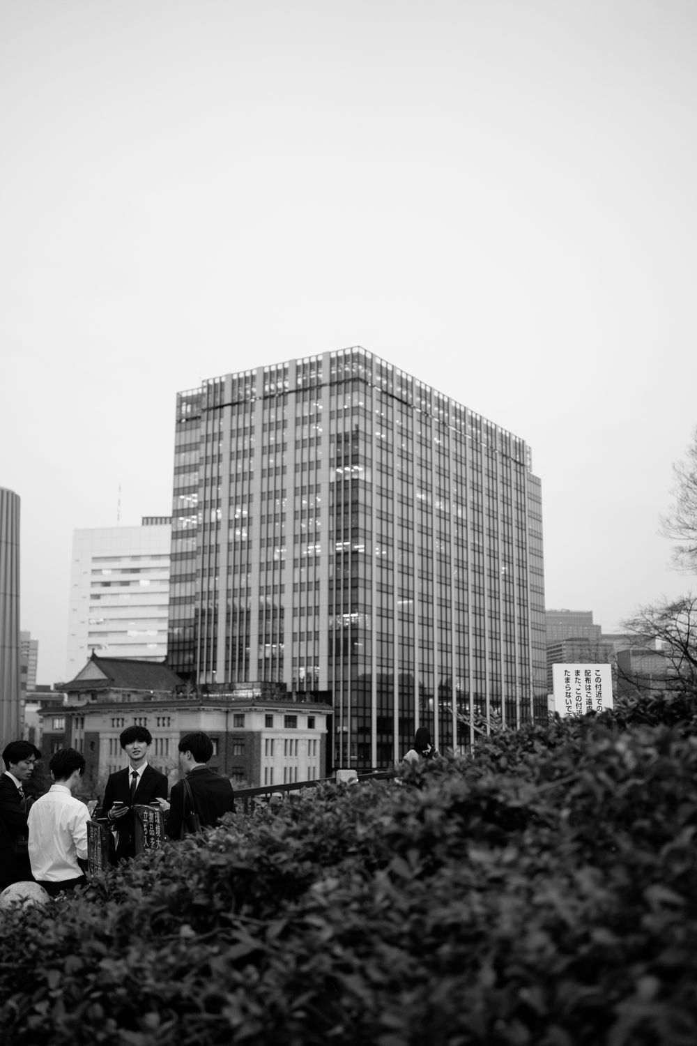Modern office buildings and architecture in black and white urban landscape.