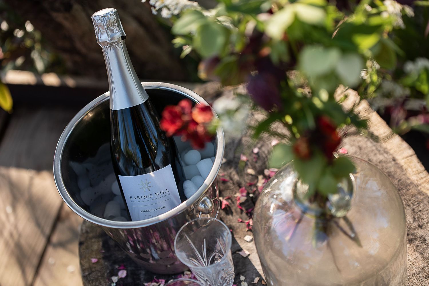 Easing Hill english wine in a wine bucket in the sunshine