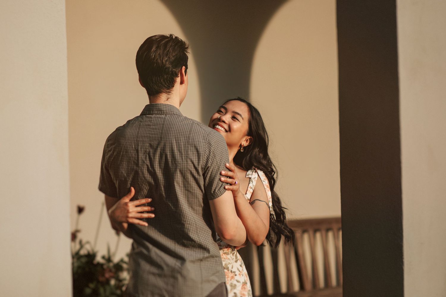 A couple embraces intimately while slow dancing at Newfields in Indianapolis.