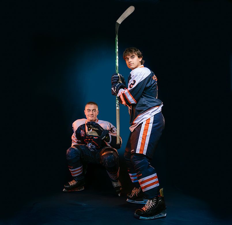 Dramatic, fun media day portrait of two Hershey Trojans hockey players, by Deanna Fox, SportsFox Photography, Hershey PA