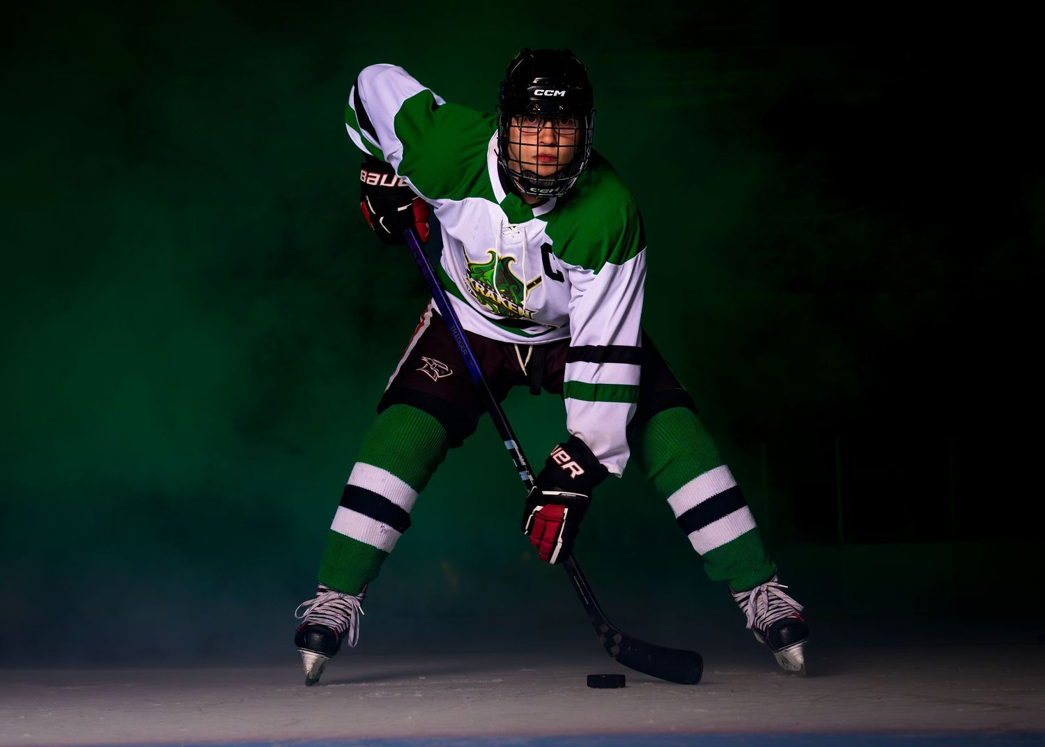 Keystone Kraken hockey player in green jersey, media day portrait, Harrisburg Pennsylvania, by SportsFox Photography.