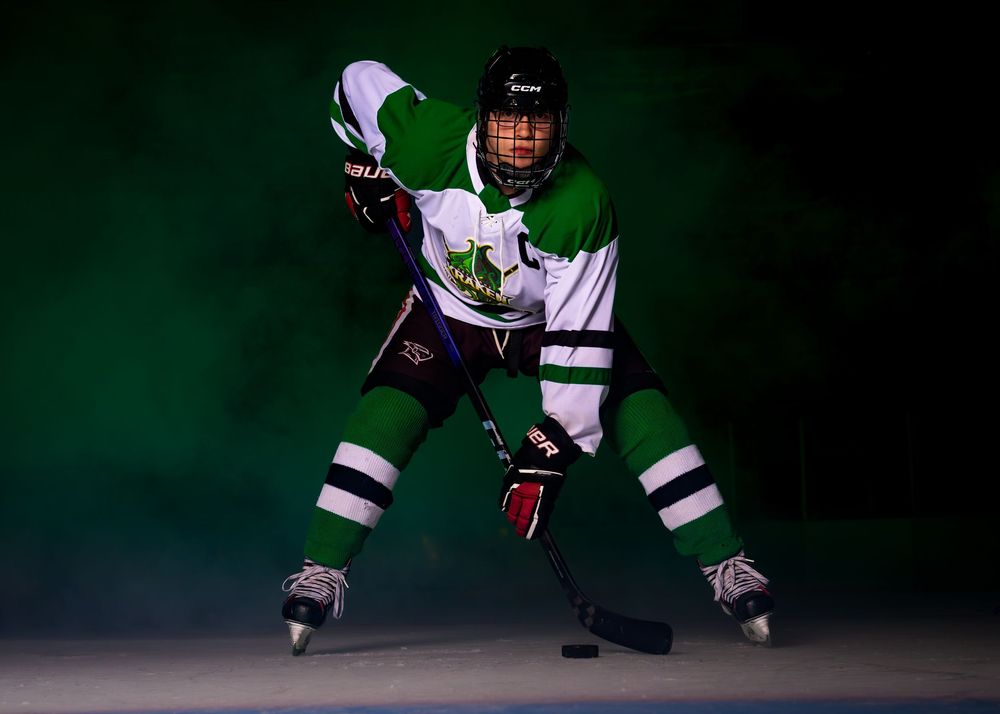 Keystone Kraken hockey player in green jersey, media day portrait, Harrisburg Pennsylvania, by SportsFox Photography.