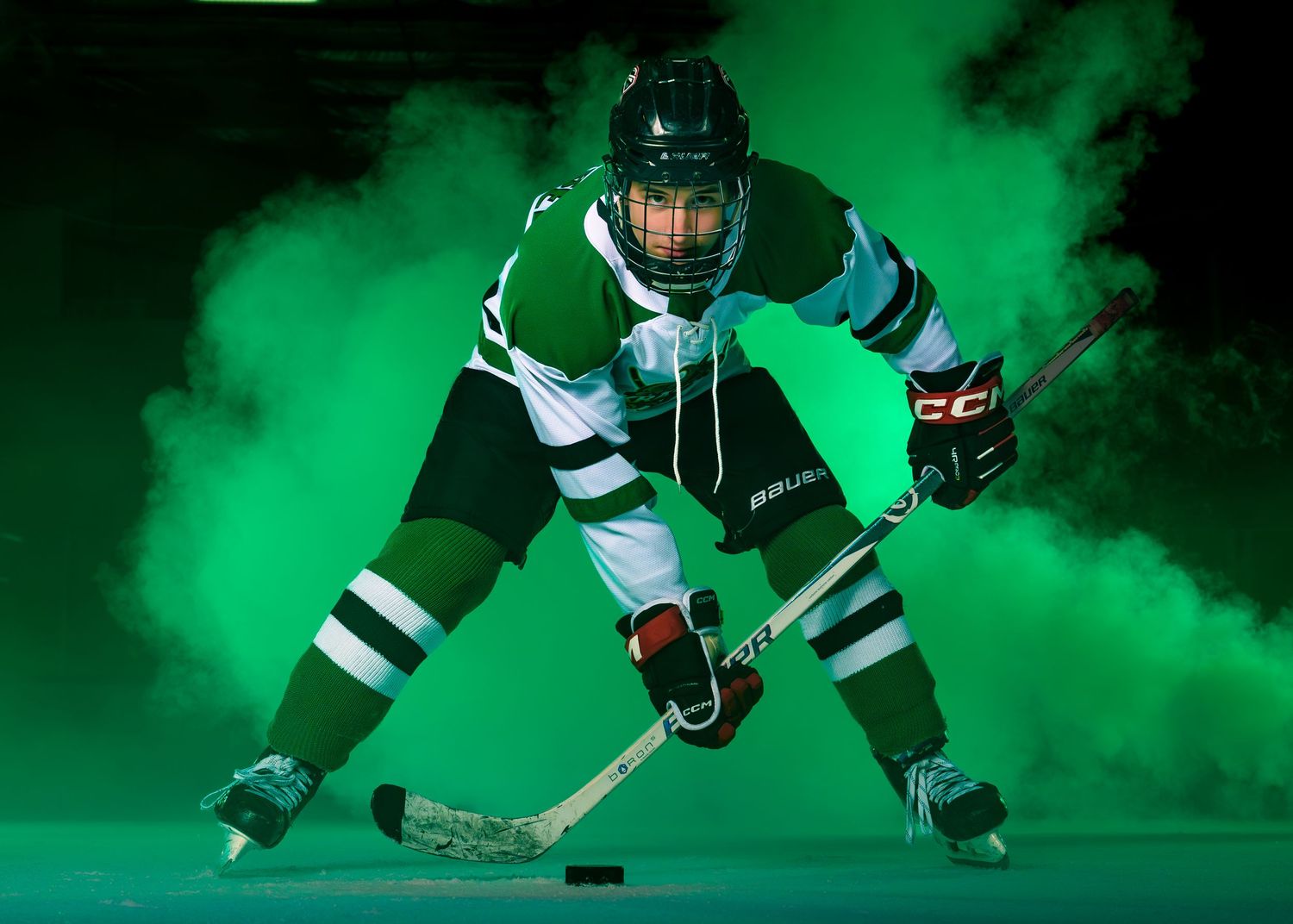 Keystone Kraken hockey player in green jersey, media day portrait, Harrisburg Pennsylvania, by SportsFox Photography.