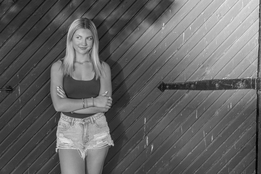A black and white collage of fitness-themed photos showing workout equipment and athletic poses.
