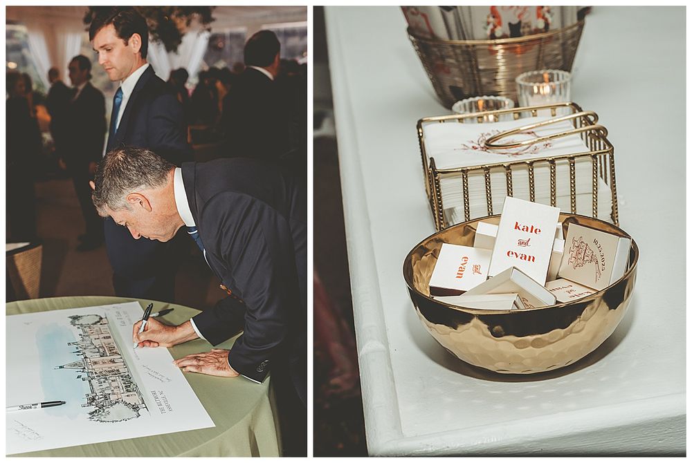 Wedding guests signing a guestbook and viewing photos at an elegant reception display.