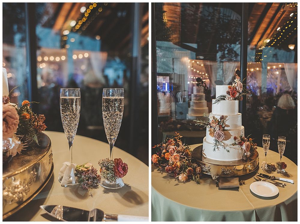Wedding reception decor details with glowing candles and elegant glassware on display tables.