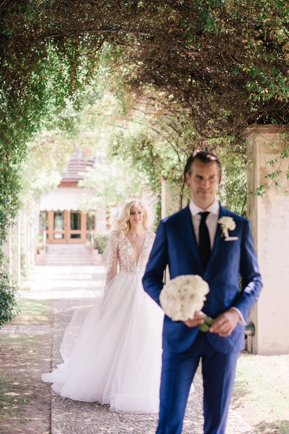 First look of bride and groom at their hotel on Lake Iseo
