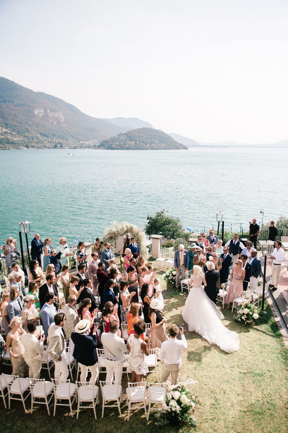 Panoramic terrace set for an intimate wedding ceremony overlooking Lake Iseo