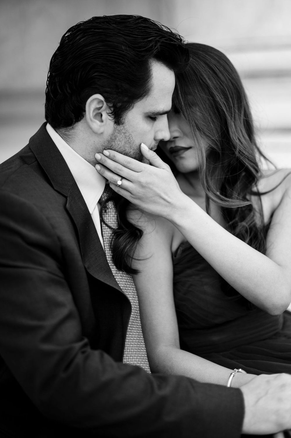 A romantic black and white photo sequence showing an intimate moment between a couple in formal attire.