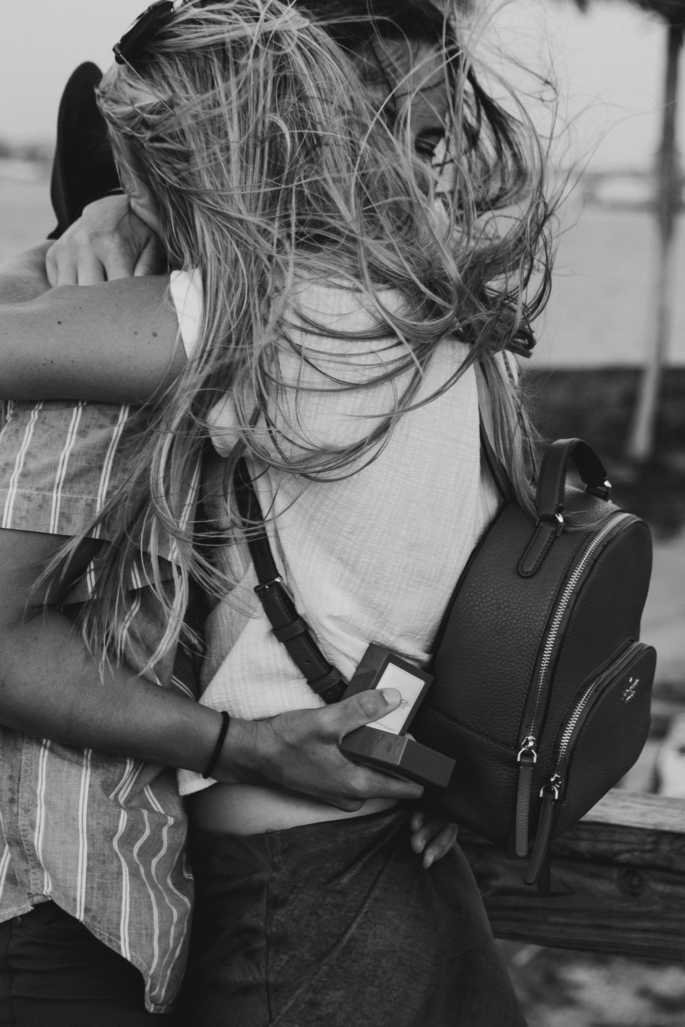 A portrait of two women embracing right after getting engaged in St. Augustine, Florida.