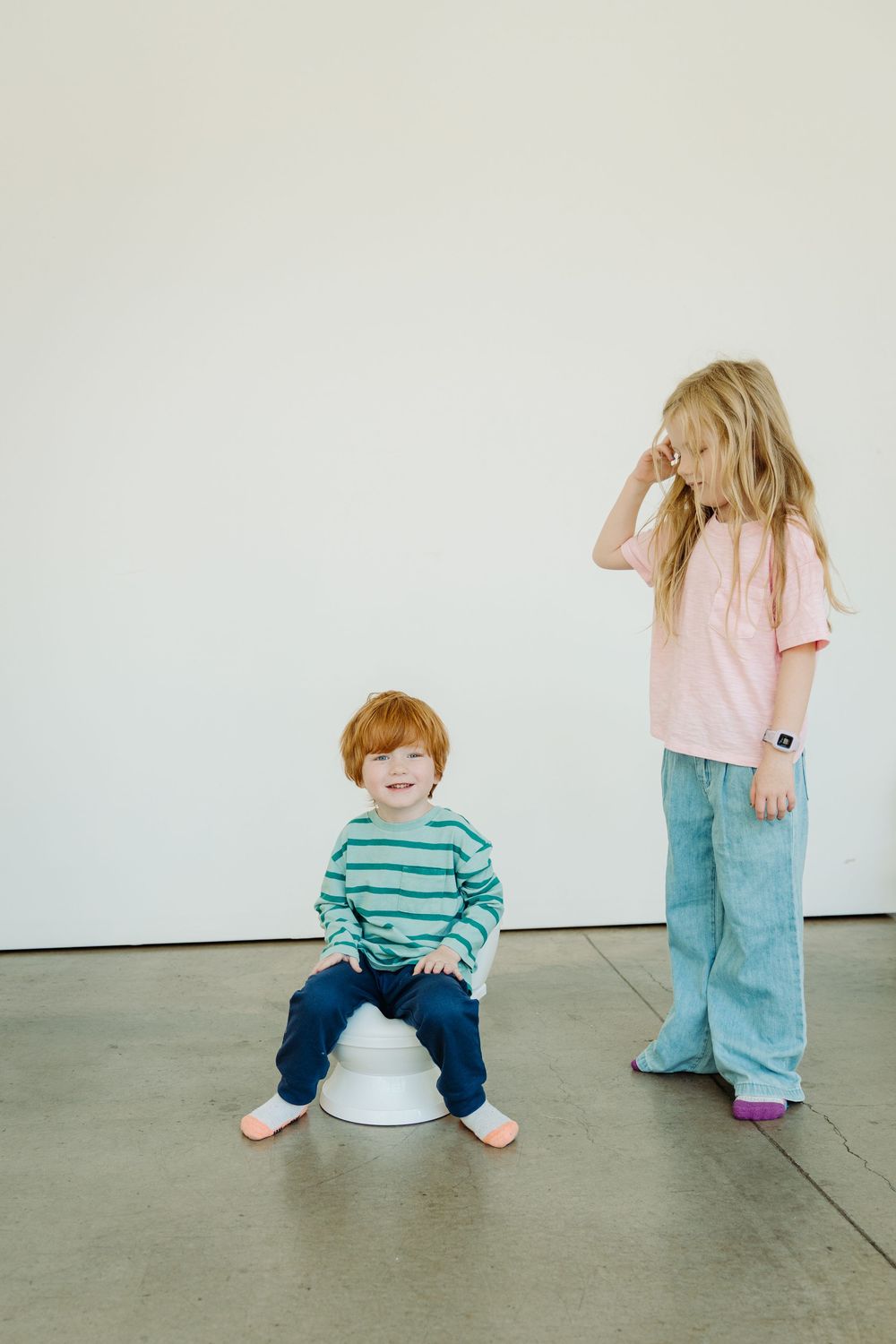 Angie holding Wizzy Fizzies product with her kids, captured by Denver brand photographer Kristin McGlone.