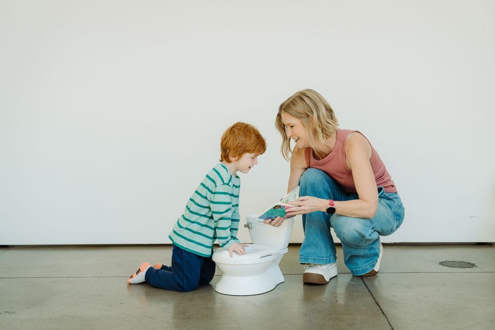 Wizzy Fizzies founder Angie mixing colors with her kids during a Denver brand photography session with McGlone Photography.