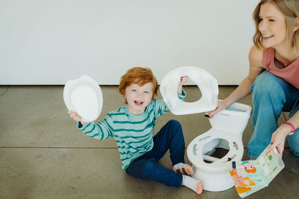 Wizzy Fizzies founder Angie mixing colors with her kids during a Denver brand photography session with McGlone Photography.