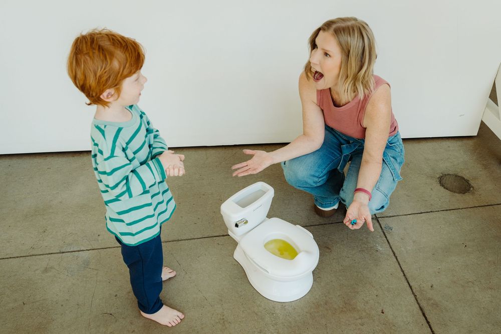 Wizzy Fizzies founder Angie mixing colors with her kids during a Denver brand photography session with McGlone Photography.