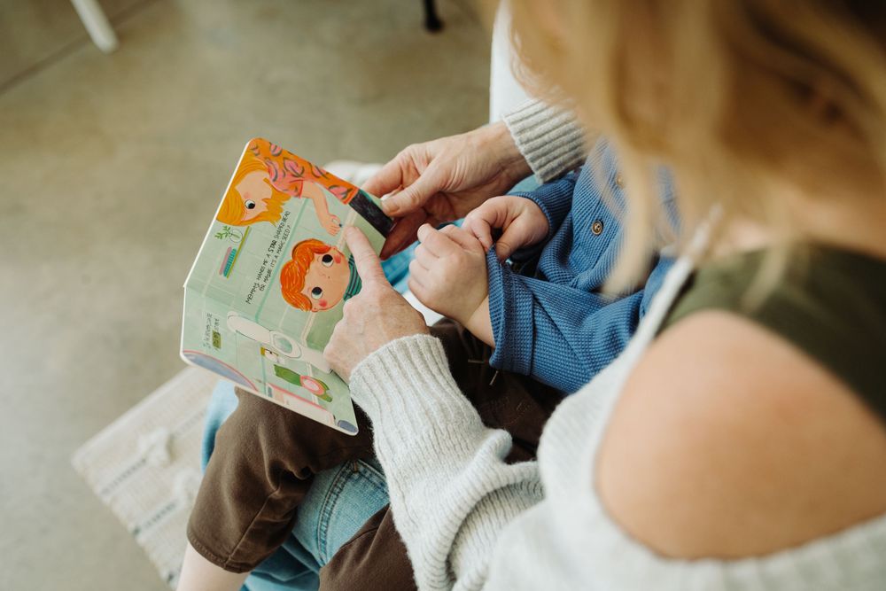 Angie holding Wizzy Fizzies product with her kids, captured by Denver brand photographer Kristin McGlone.