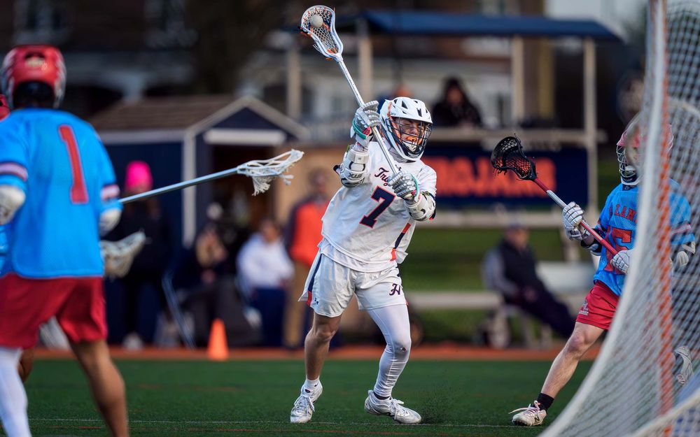 Hershey Trojans attack near the crease vs. Red Land, boys lacrosse by Deanna Fox, SportsFox Photography based in Hershey PA