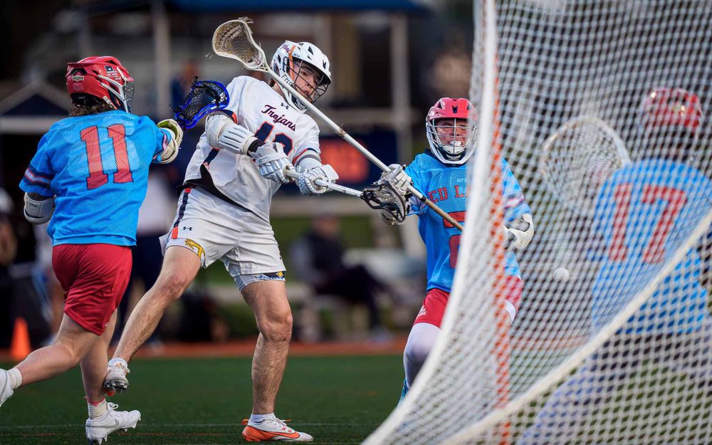 Red Land Patriots at the crease vs. Hershey Trojans, boys lacrosse by Deanna Fox, SportsFox Photography based in Hershey PA