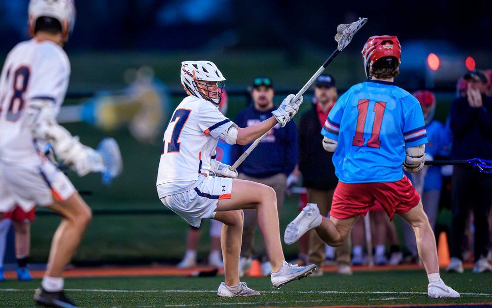 Hershey Trojans vs. Red Land Patriots midfield battle, boys lacrosse by Deanna Fox, SportsFox Photography based in Hershey PA