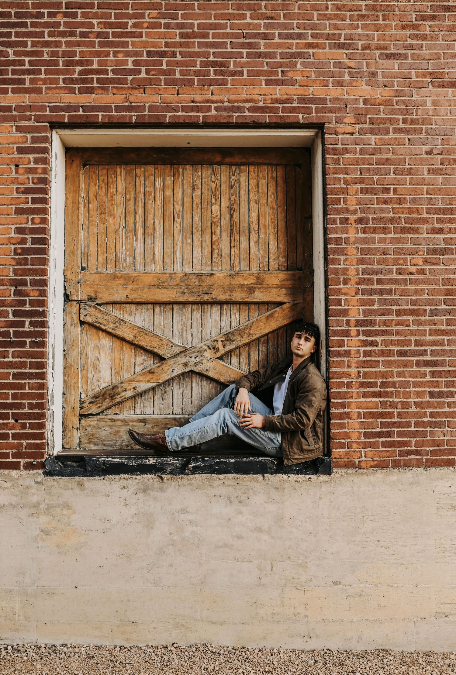 Editorial senior portraits for boys in McKinney Texas with industrial textures and denim styling