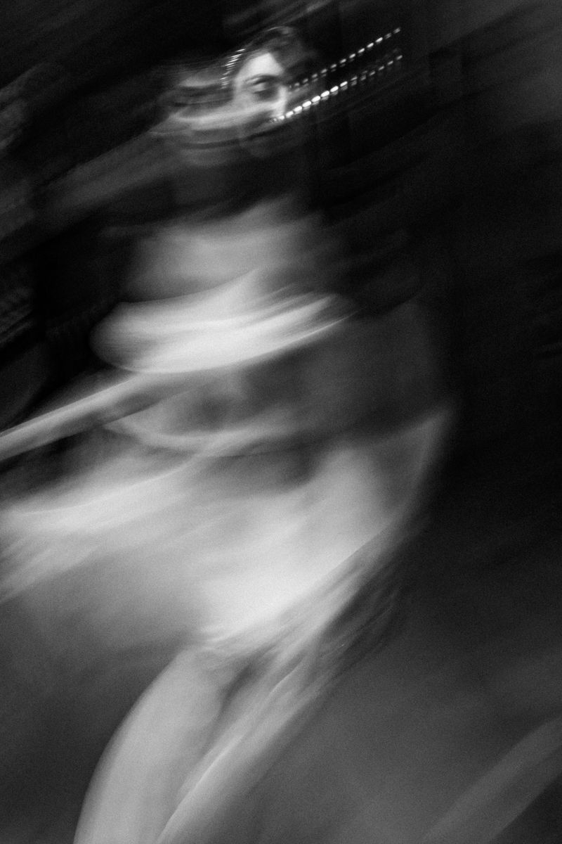 Abstract black and white motion blur creating artistic wedding photography effect.