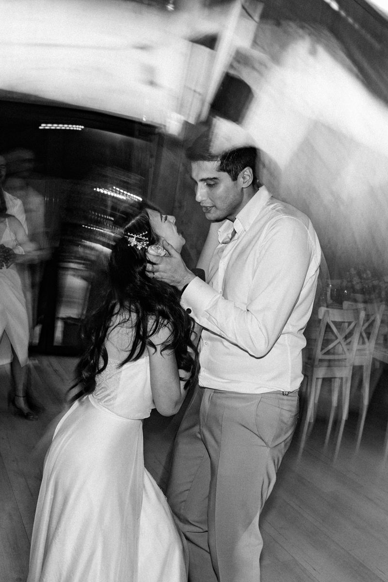 Black and white photos capturing intimate dance moments at wedding reception.
