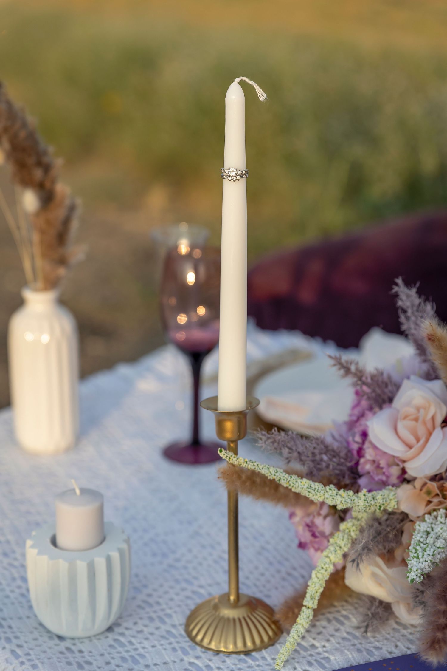 details of sweetheart table wedding ring on candle. Boise wedding photographer.