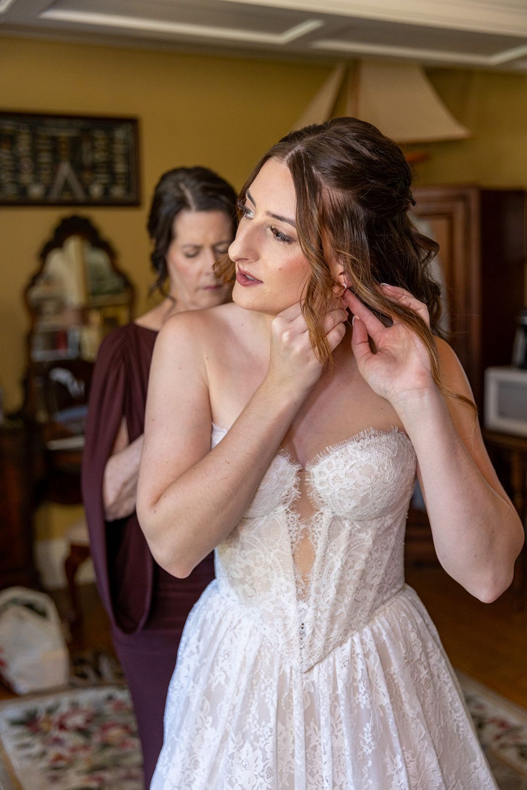 bride getting ready at thornewood castle wedding  bridal suite