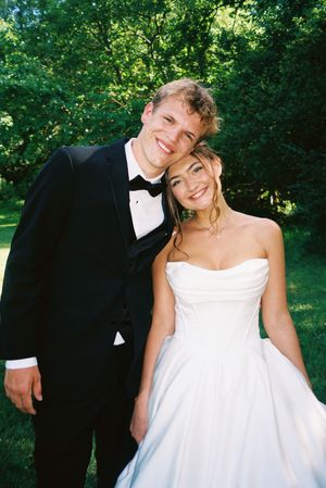 A romantic wedding photo sequence captured in a sunny garden setting with formal attire.