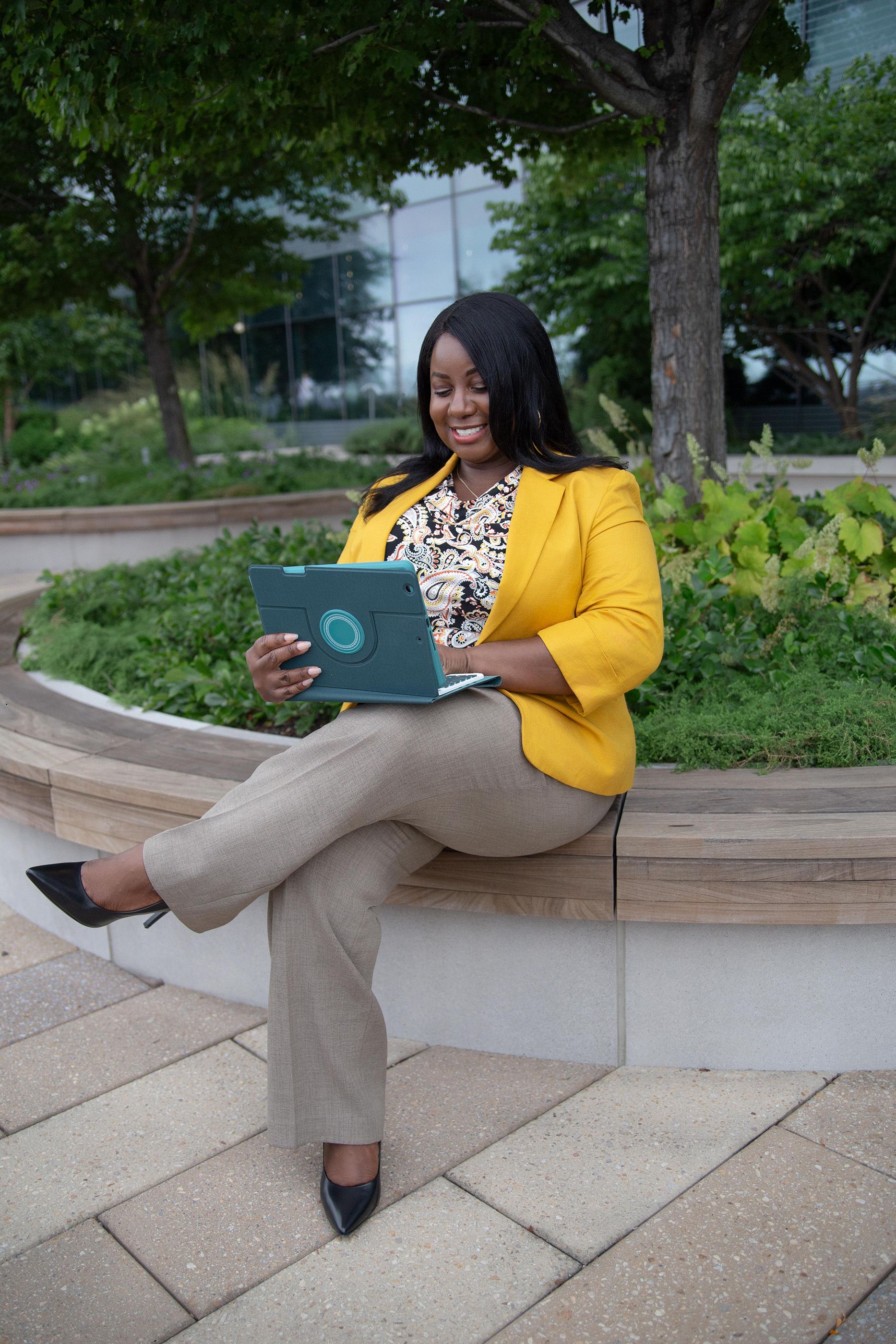Personal branding photo of an entrepreneur working on a laptop
