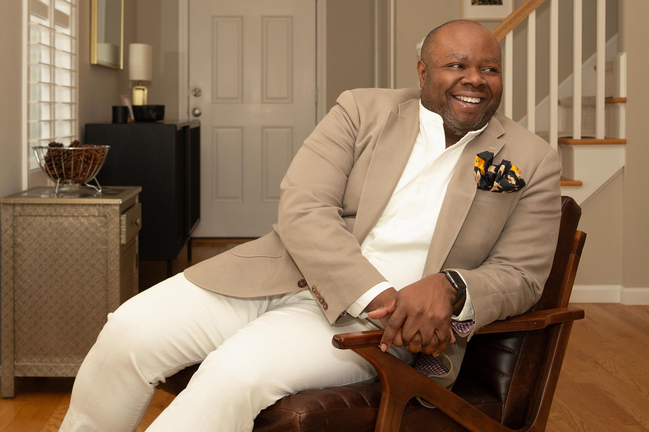 Lifestyle branding image of confident executive in home-inspired living room | Northern New Jersey branding photographer
