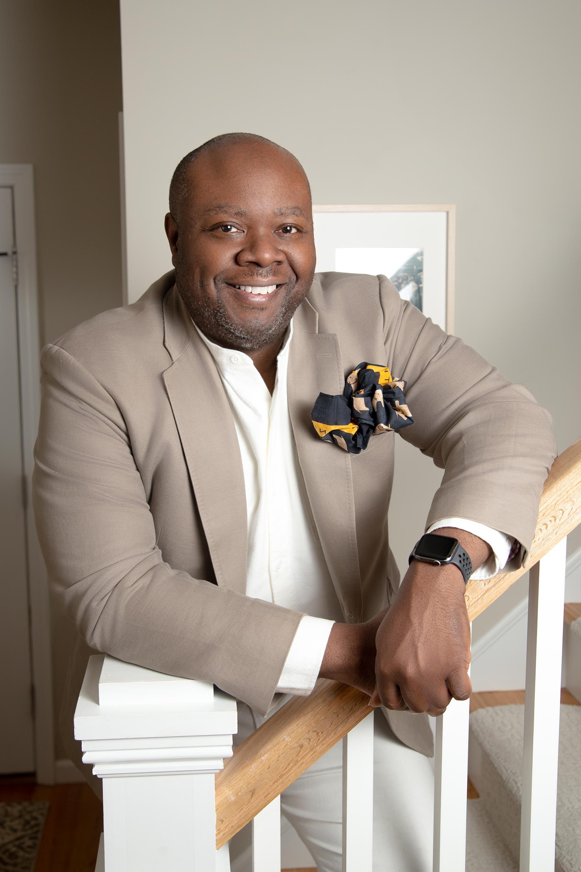 Modern executive portrait smiling in a home setting | Northern New Jersey branding photographer
