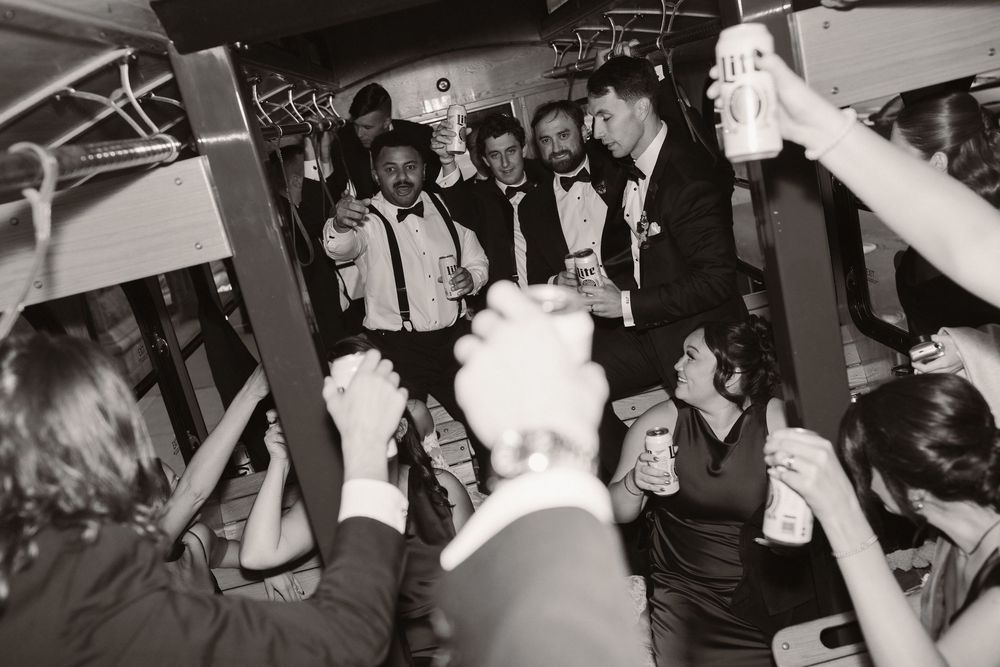 Black and white photos show a crowded dance floor with people dancing and celebrating at what appears to be a party or event.