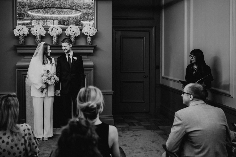 A collection of black and white vintage photographs showing people in formal attire at various social gatherings.