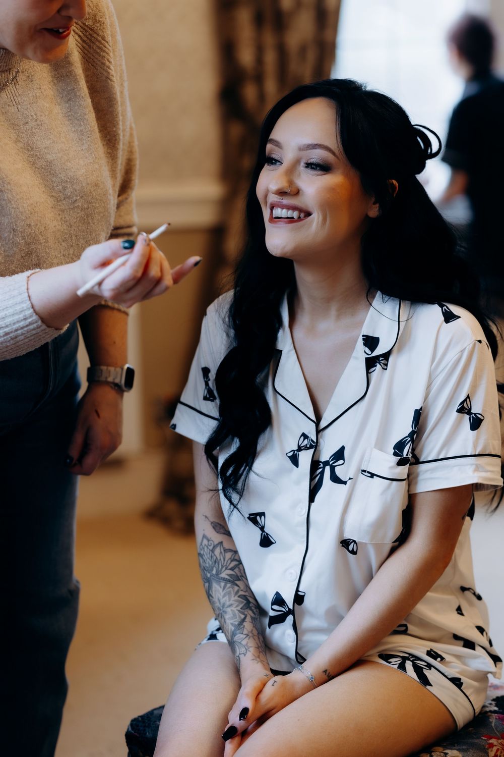 A couple shares intimate moments in a romantic photoshoot sequence showing laughter and connection.