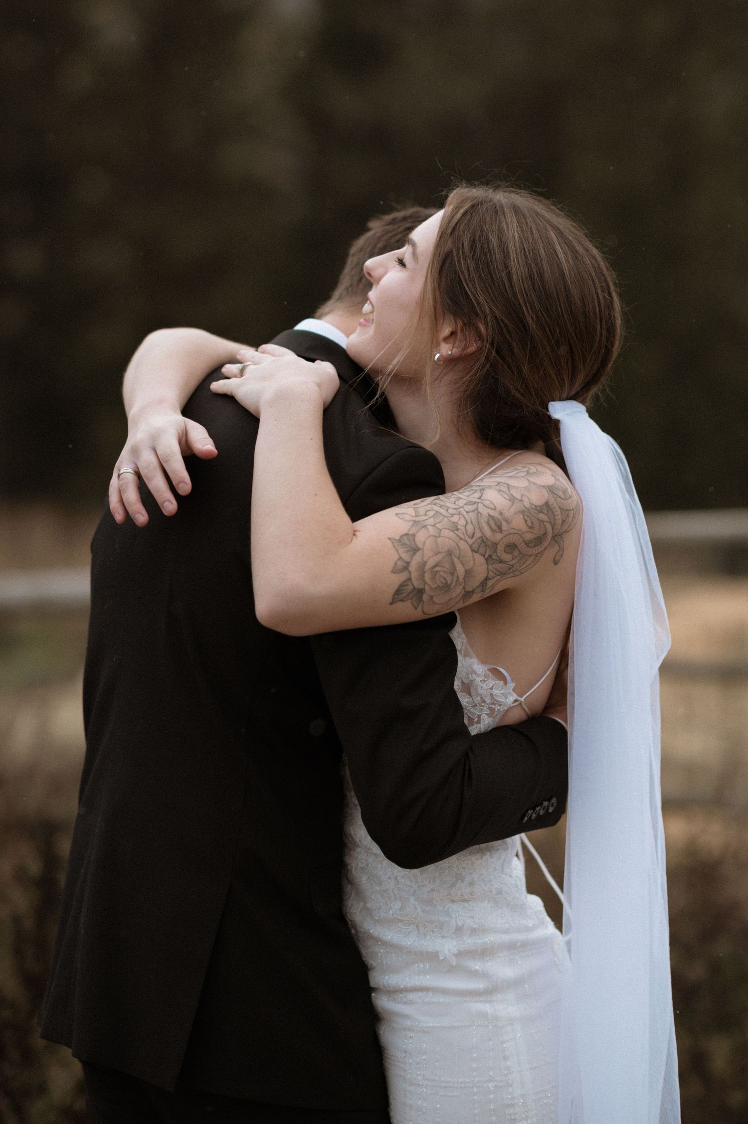 Bride and groom hugging