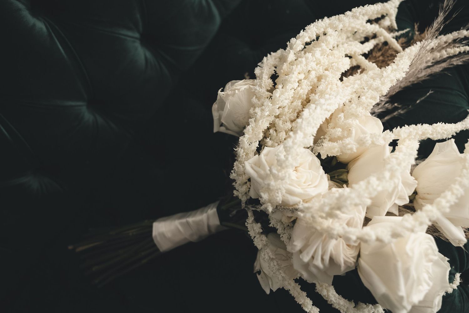Modern white bridal bouquet with dried florals and classic roses — timeless wedding blooms in Buckhannon, West Virginia.