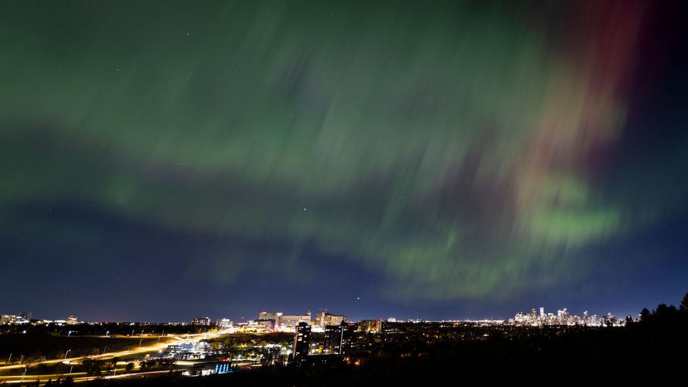 Aurora Borealis, the Northern Lights dancing over Calgary, YYC, Alberta, Canada