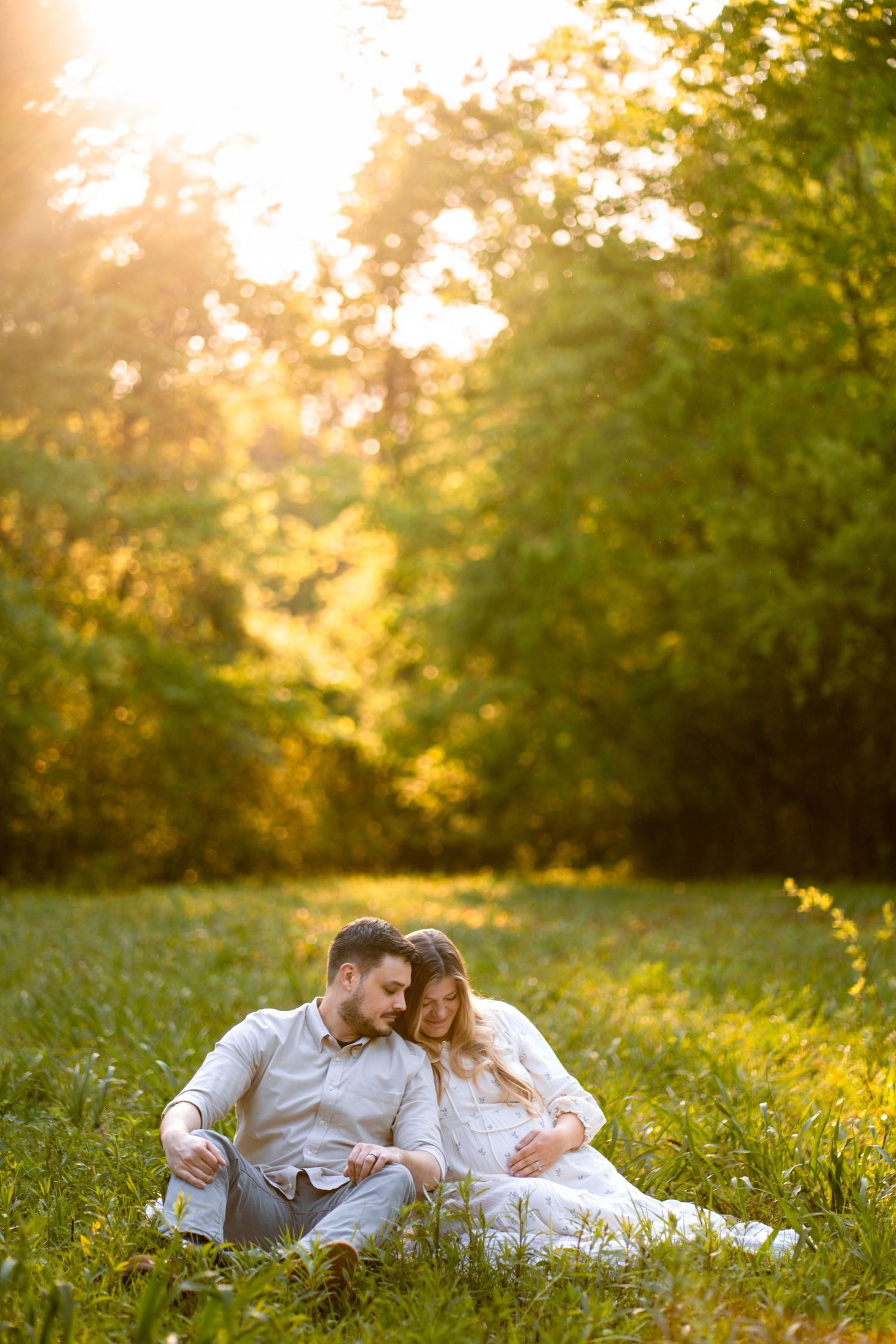 Pregnant wife with husband at a Marietta park maternity session